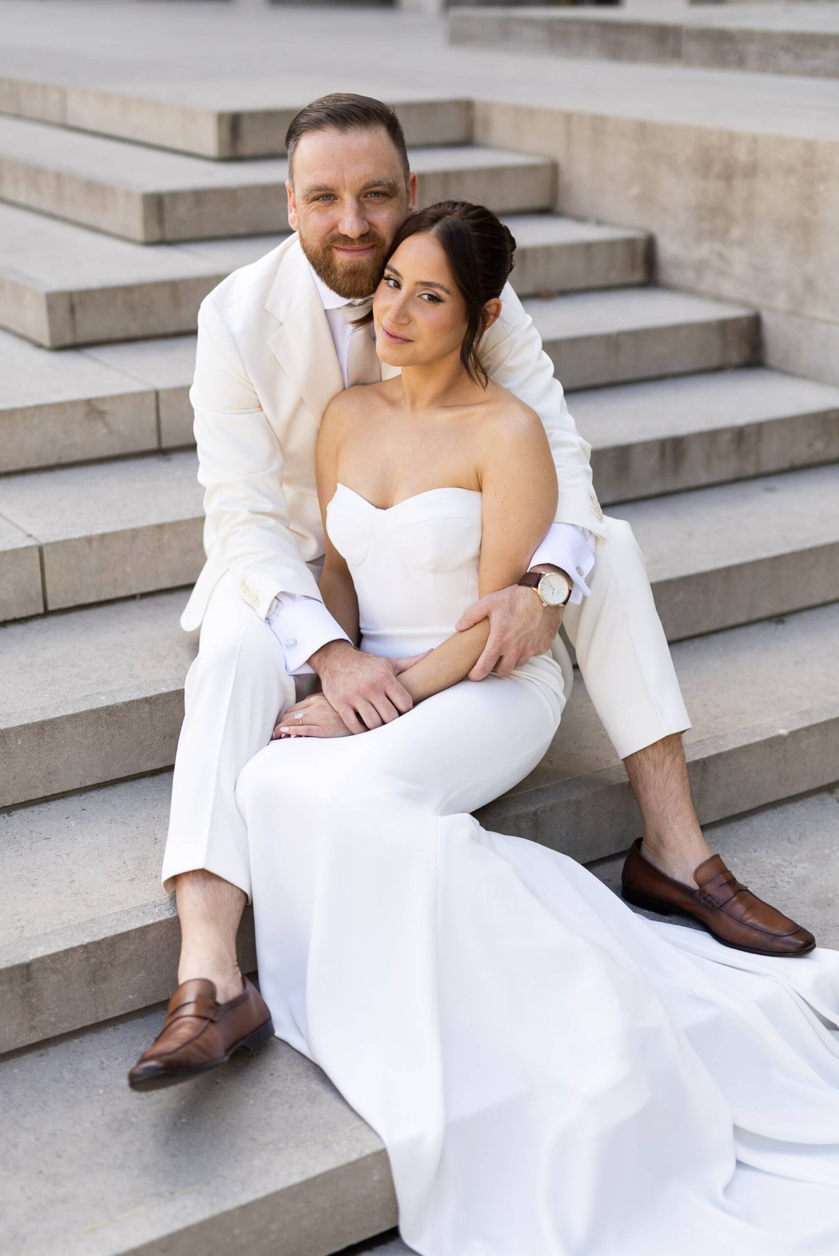 Toronto Jewish Wedding, Zsuzsi Pal Photography, Bride and Groom sit on ROM steps, Royal Ontario Museum