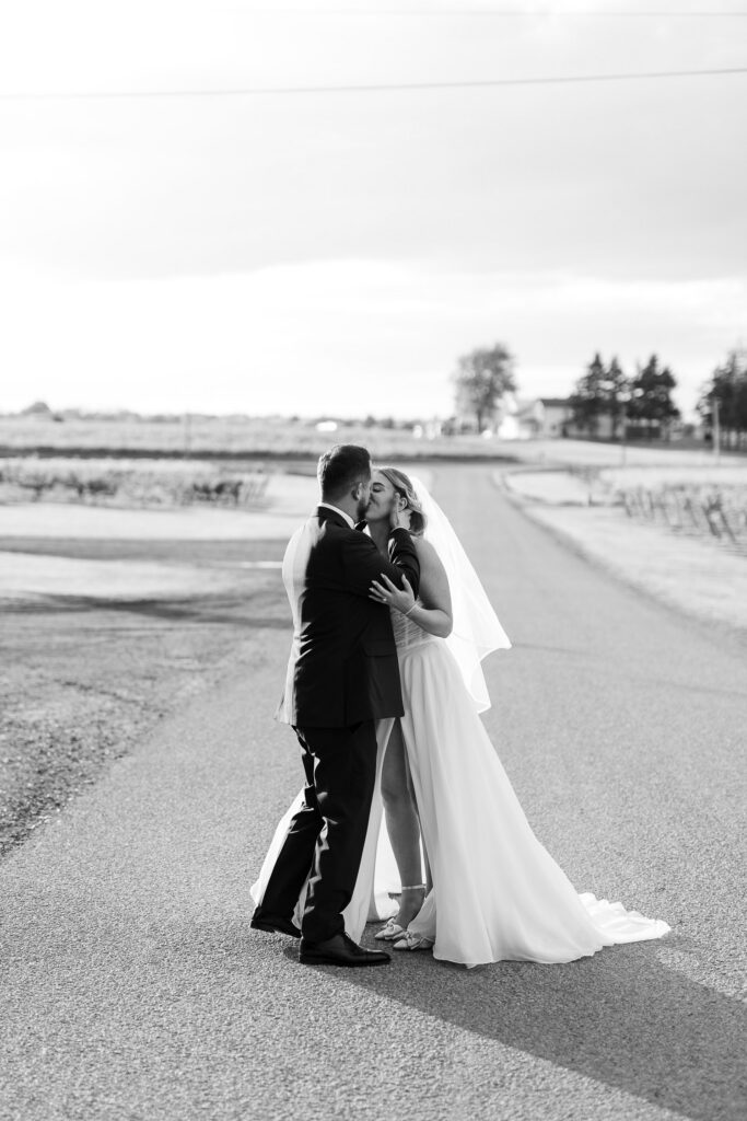candid black and white portrait of a couple laughing during a Toronto wedding photoshoot